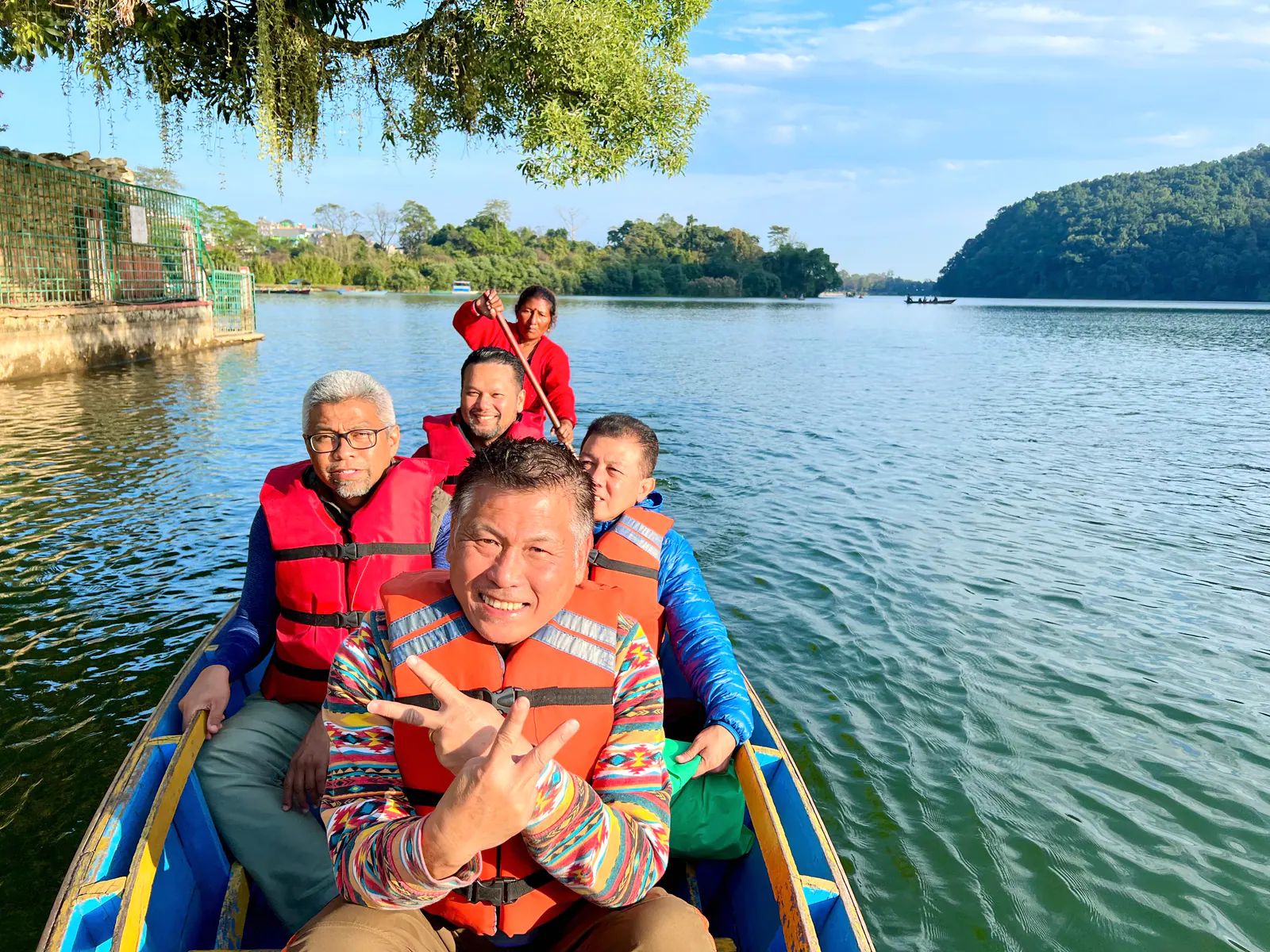 Travelers boating on Phewa Lake in Pokhara